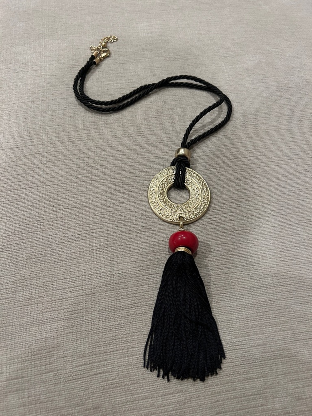 Chicos Gold-Tone Medallion Tassel Necklace with Black and Red Accents